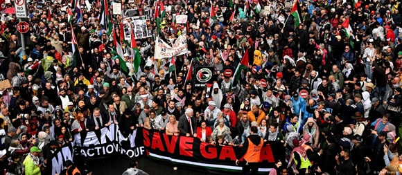 assange marcha por palestina sidney