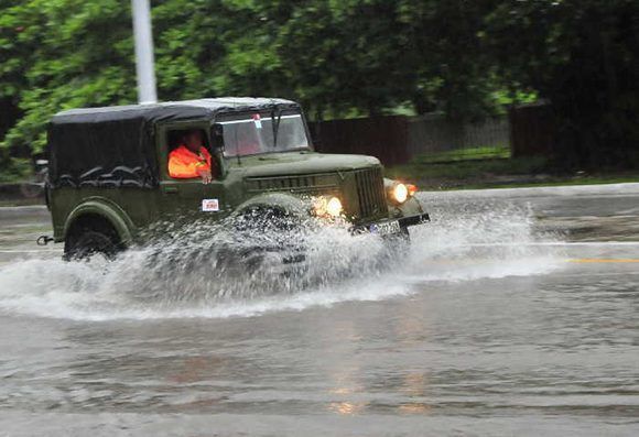 transporte interrumpido por las intensas lluvias en sancti spiritus 580x397